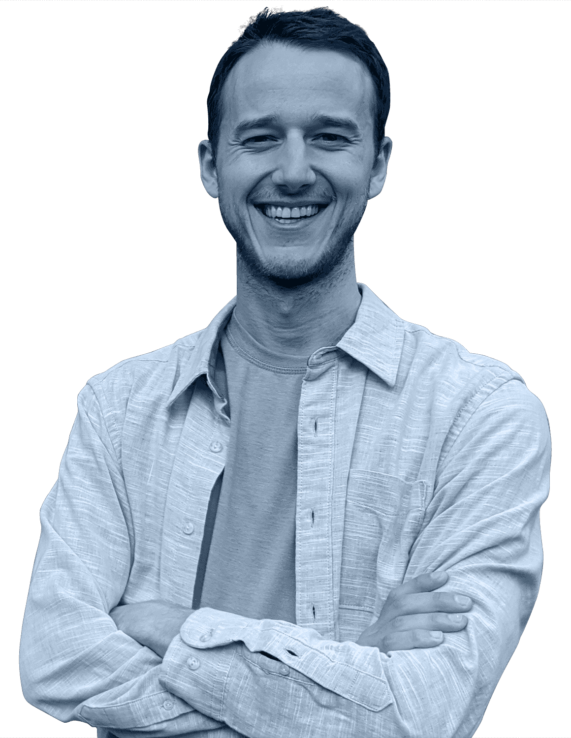 Ben smiling with his arms crossed